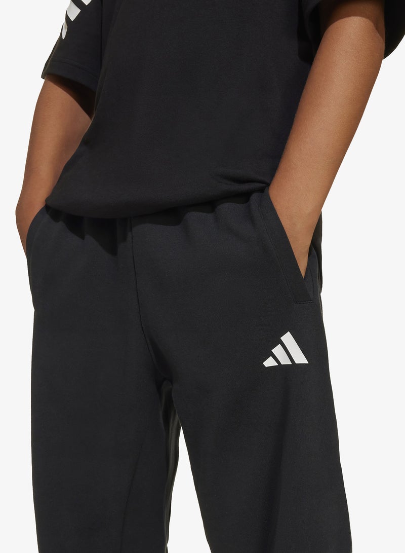 adidas بنطلون رياضي واسع بثلاثة خطوط للشباب - Image 3