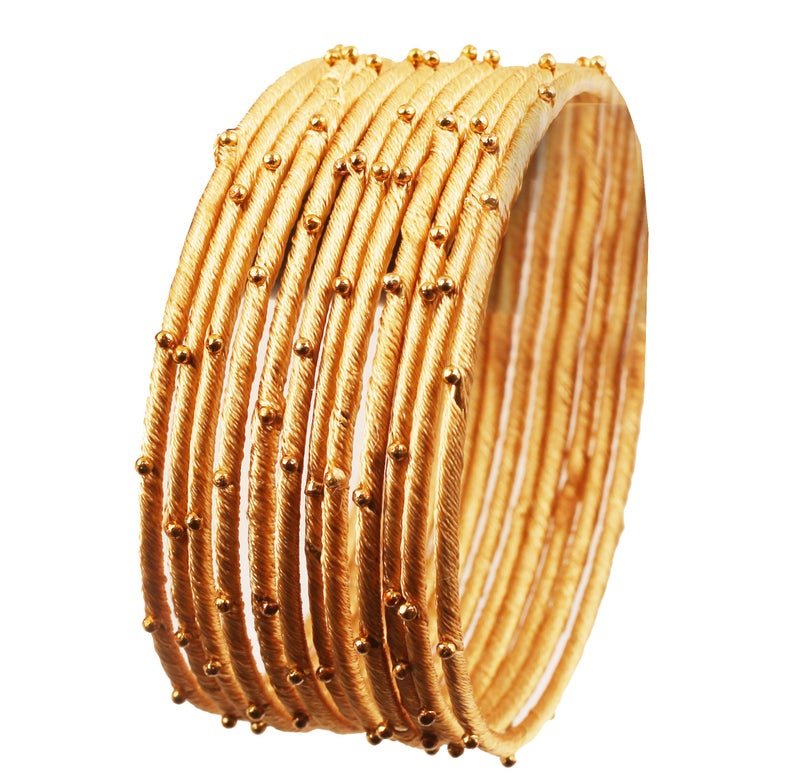 Touchstone "Silk Thread Bangle Collection Indian Bollywood Handcrafted Faux Silk Thread Exotic Look with Golden Beads Light Yellow Designer Bangle Bracelets Set of 12 For Women - Image 1