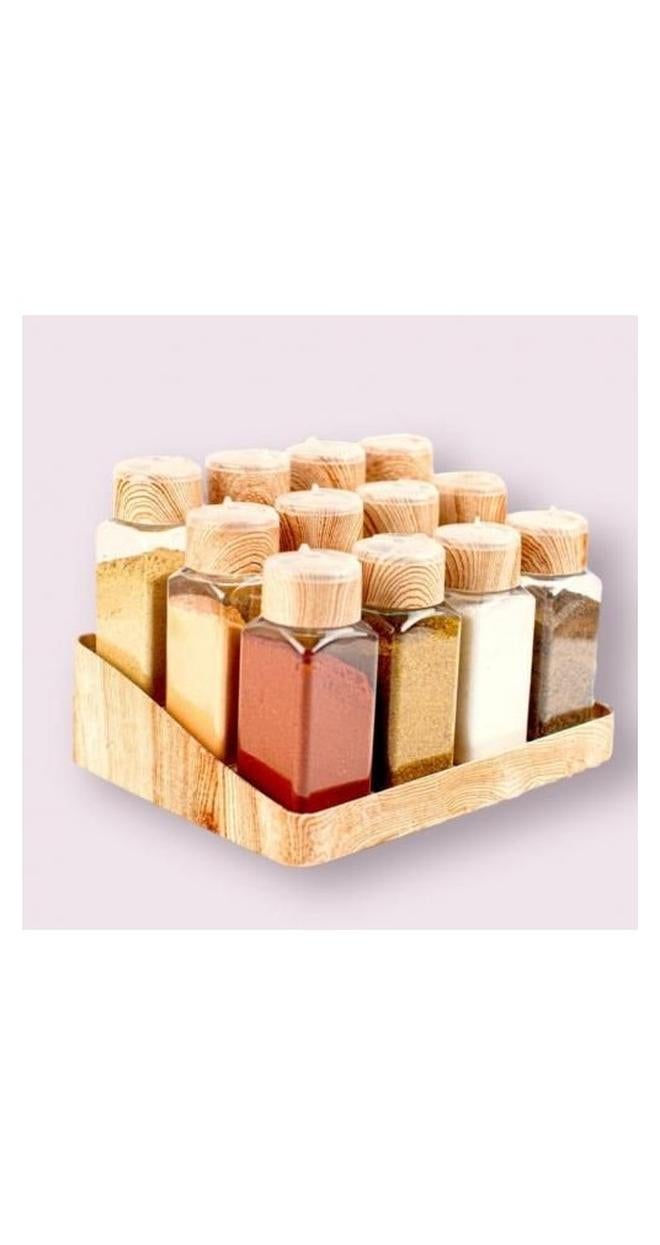 سبيس شوب طقم مرطبانات بلاستيك 12 قطعة تصميم شفاف بالوان خشبية - Image 1