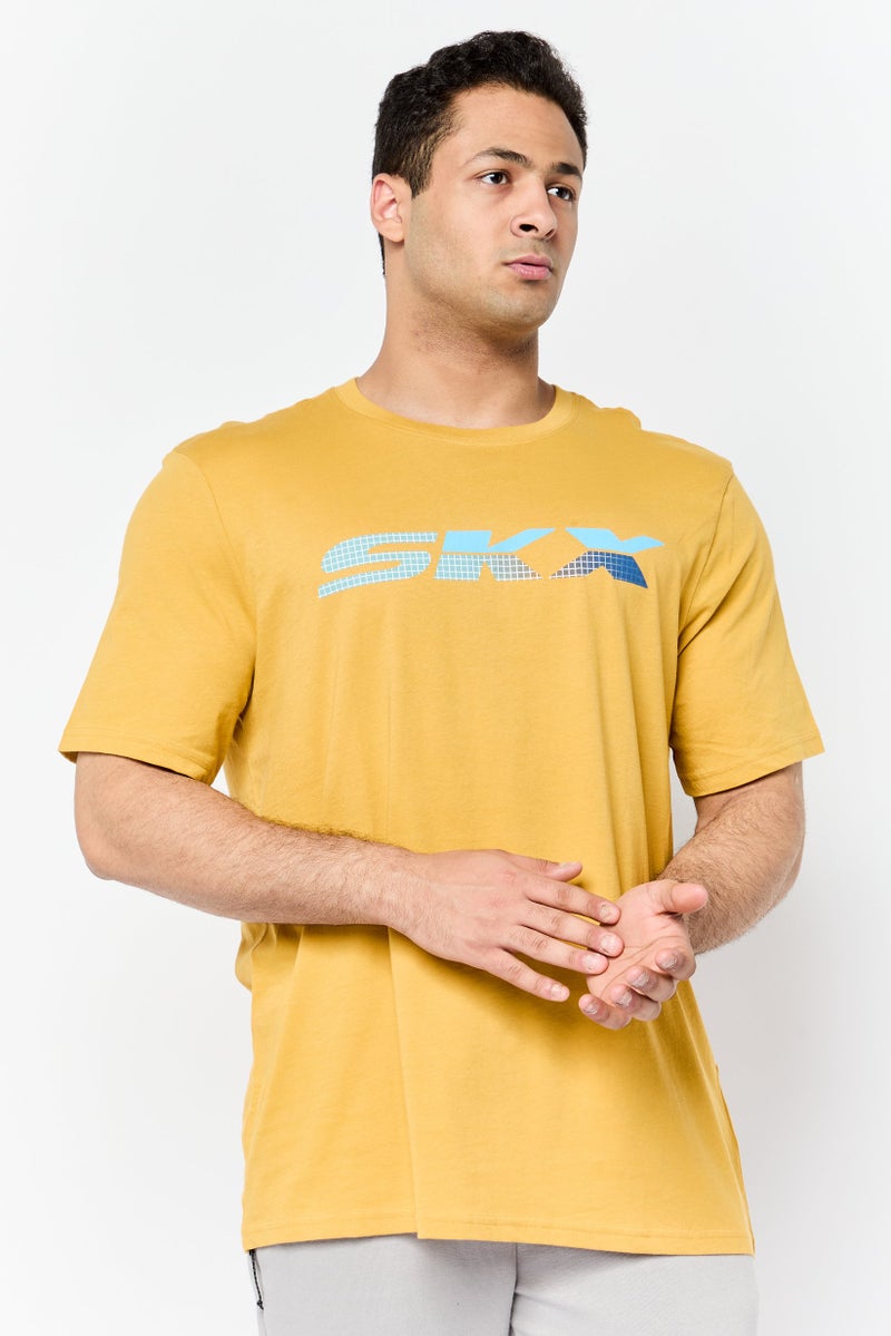 SKECHERS Men Sportswear Fit Short Sleeves Training T-Shirt, Mustard - Image 1