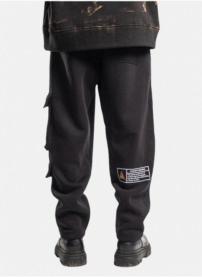 BLACK EDITION UNISEX WARNING CARGO SWEATPANTS  - Image 1