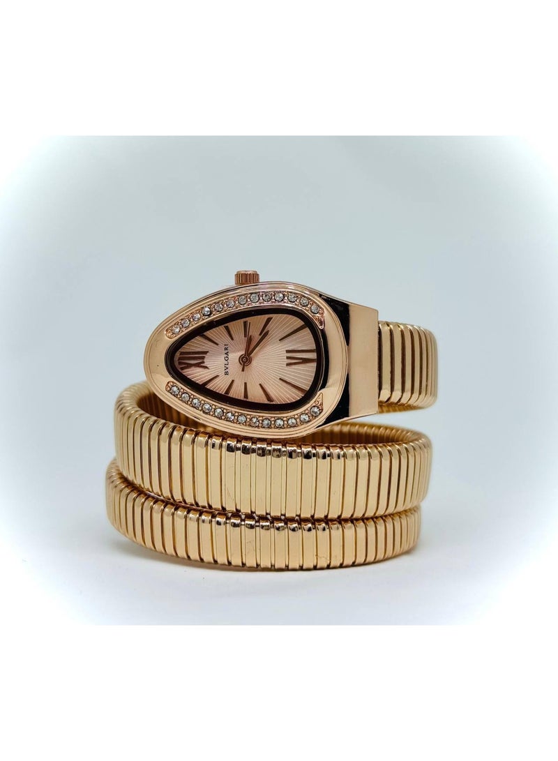 بولغاري ساعة يد حريمي روز جولد بسوار ملفوف – مينا بيضاوي بإطار مرصع