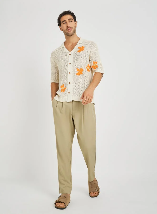 ستايلي بلوزة كروشيه مطرزة بالزهور بقصة مريحة