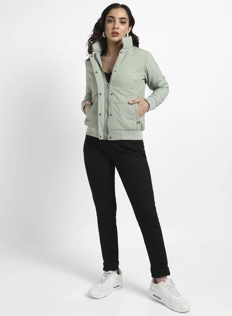 Campus Sutra Women's Sage Green Puffer Jacket With Ribbed Hem For Casual Wear | High Neck  | Long Sleeve | Zipper Closure | Jacket Crafted With Comfort Fit For Everyday Wear