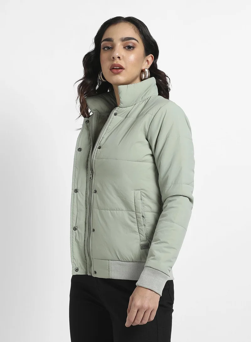 Campus Sutra Women's Sage Green Puffer Jacket With Ribbed Hem For Casual Wear | High Neck  | Long Sleeve | Zipper Closure | Jacket Crafted With Comfort Fit For Everyday Wear