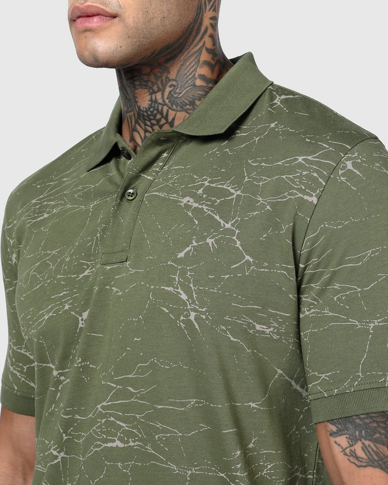 bewakoof  Men's Capulet Olive Green All Over Printed Polo T-shirt for Men | Best Price UAE