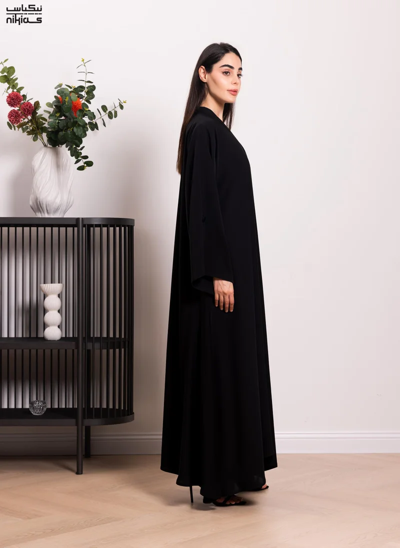 نيكياس Nikias Nida plain abaya with a pleate and back and sleves