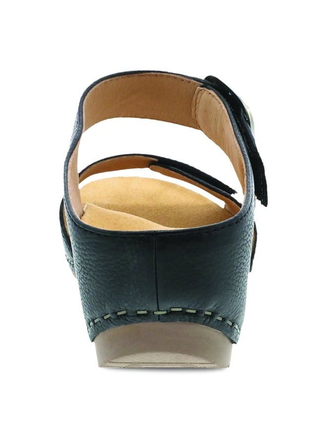Dansko Tanya Slip-On Wedge Sandal for Women - Cushioned, Contoured Footbed for All-Day Comfort and Support - Hook & Loop Strap with Buckle Detail - Lightweight Rubber Outsole Tanya Black 8.5-9 M US - Image 5