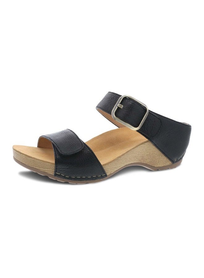 Dansko Tanya Slip-On Wedge Sandal for Women - Cushioned, Contoured Footbed for All-Day Comfort and Support - Hook & Loop Strap with Buckle Detail - Lightweight Rubber Outsole Tanya Black 8.5-9 M US - Image 1