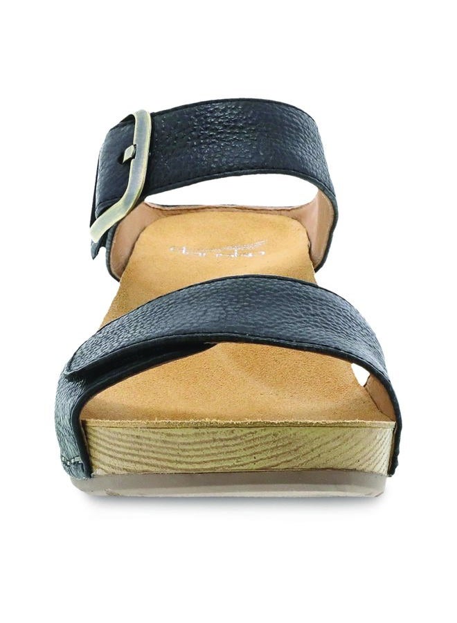 Dansko Tanya Slip-On Wedge Sandal for Women - Cushioned, Contoured Footbed for All-Day Comfort and Support - Hook & Loop Strap with Buckle Detail - Lightweight Rubber Outsole Tanya Black 8.5-9 M US - Image 4
