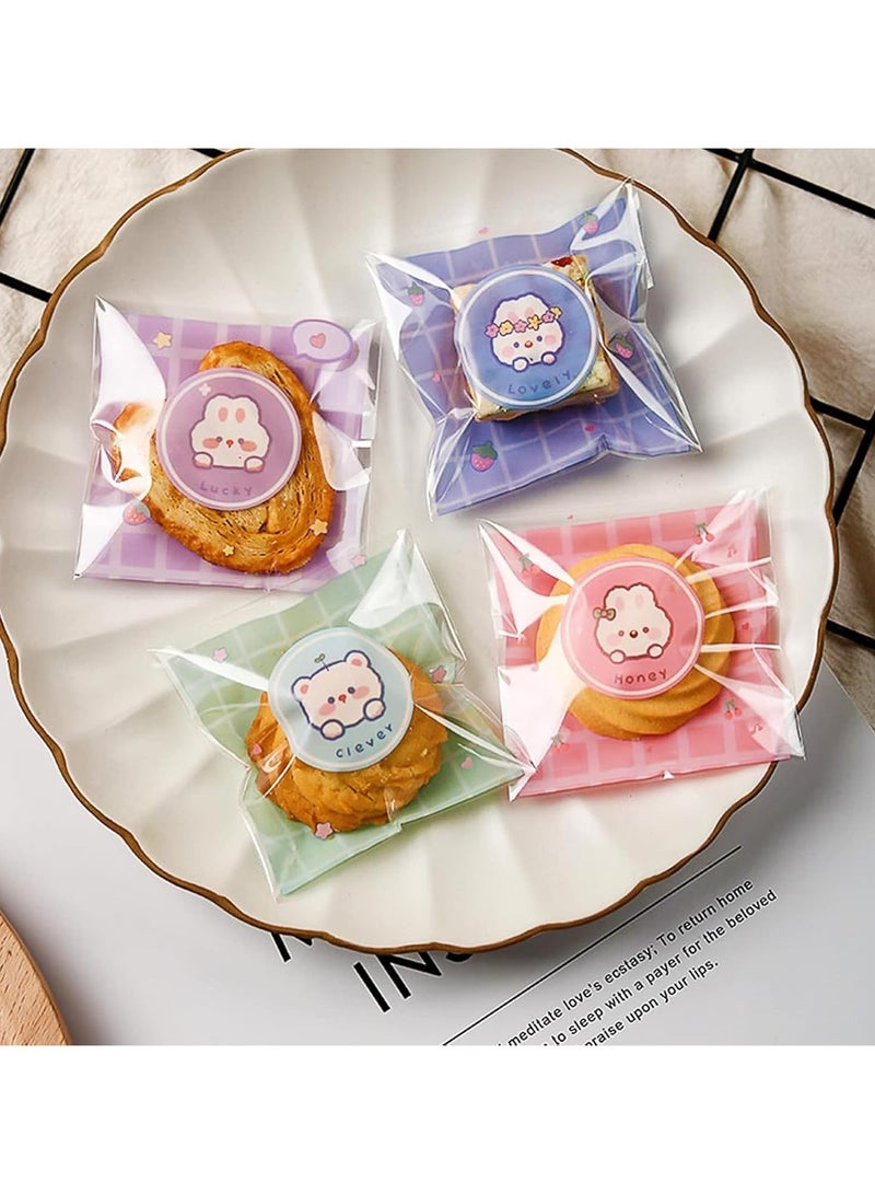 عام **أكياس بسكويت لطيفة، أكياس شفافة للبسكويت والمخبوزات، هدايا، تغليف الحلوى البلاستيكية الفردية، ذات لاصق ذاتي من OPP. تأتي العبوة بـ 100 كيس. مثالية لتغليف البسكويت، الحلويات، والمخبوزات، وتزيينها.** - Image 3