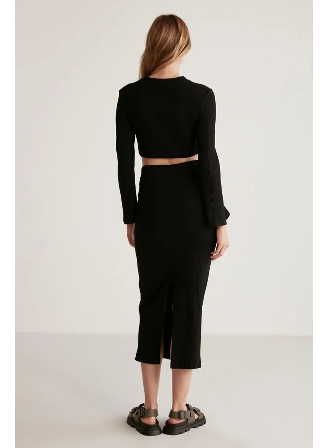 GRIMELANGE Grimelange Darlene Women's Ribbed Stretch Fabric Flare Sleeve Elastic Hem Stopper Crop Black Blouse
