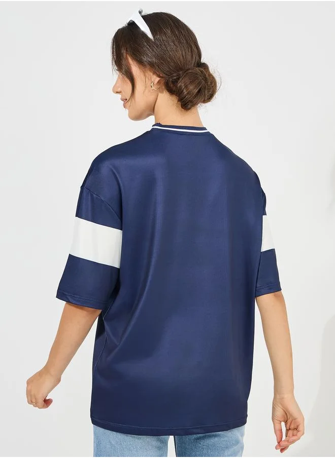 Styli Styli Oversized Slogan Print T-Shirt with Contrast Sleeves
