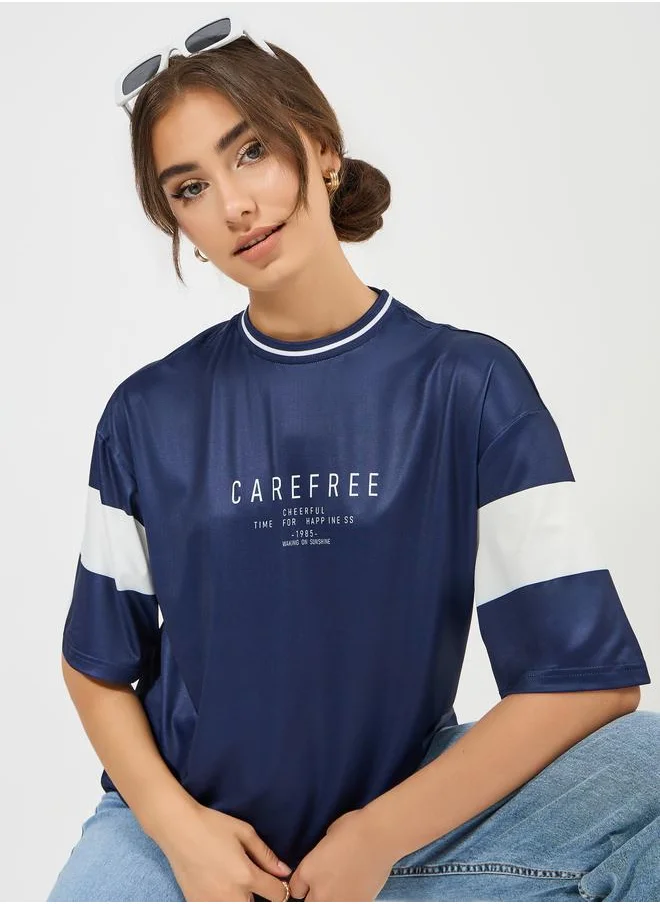 Styli Styli Oversized Slogan Print T-Shirt with Contrast Sleeves