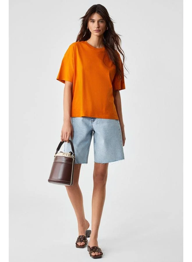 GRIMELANGE Jemmy Women's 100% Organic Cotton Relaxed Fit Slit Round Neck Orange T-Shirt.
