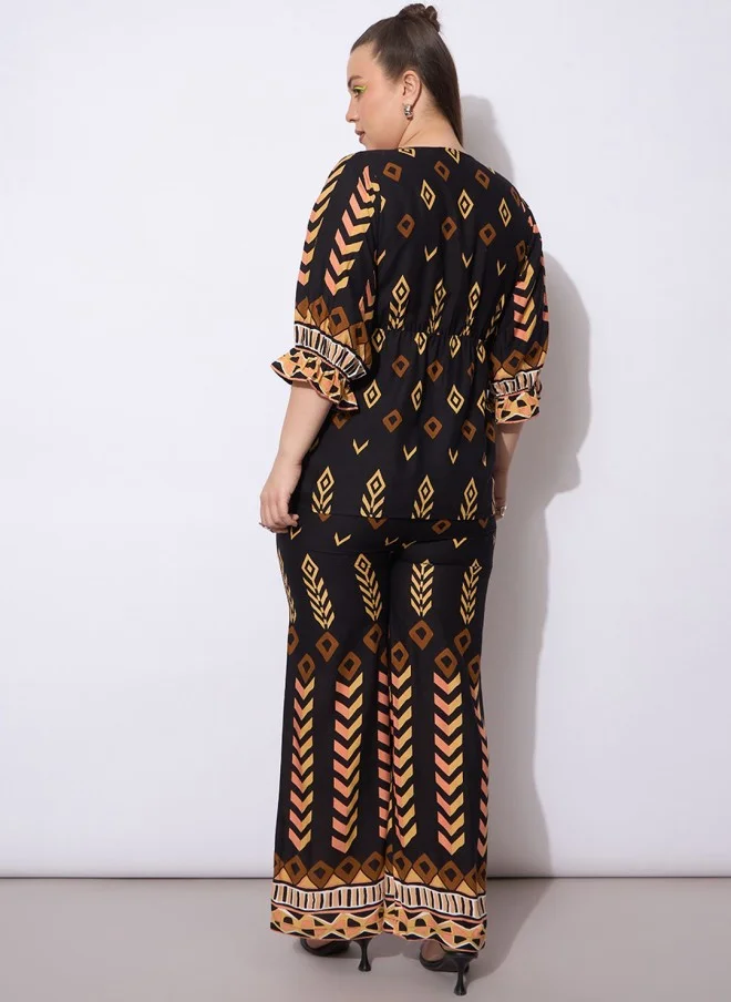 SASSAFRAS Geometric Printed Peplum Top And Trousers Co-Ords For Women