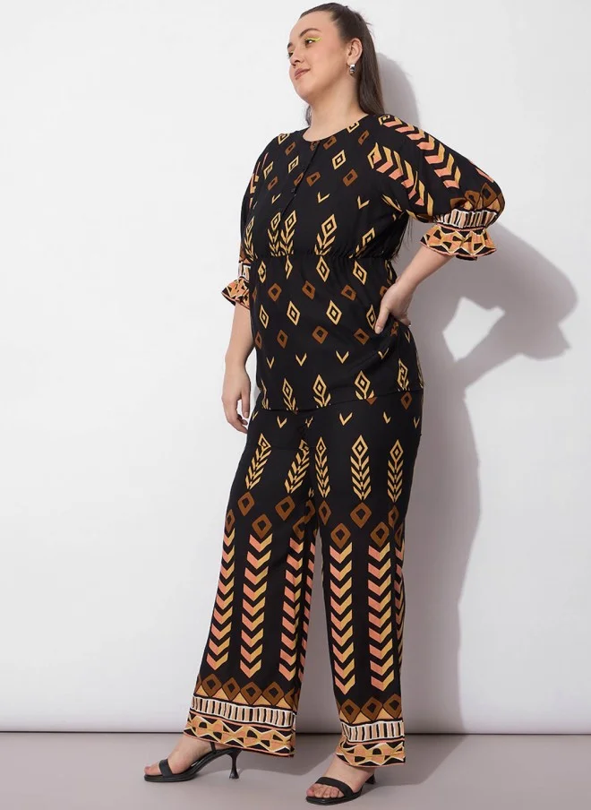 SASSAFRAS Geometric Printed Peplum Top And Trousers Co-Ords For Women
