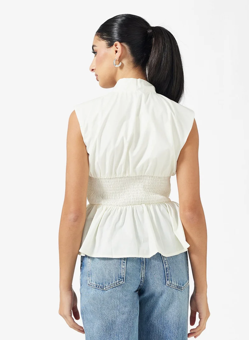 ايلا بلوزة بكسرات وسحاب أمامي