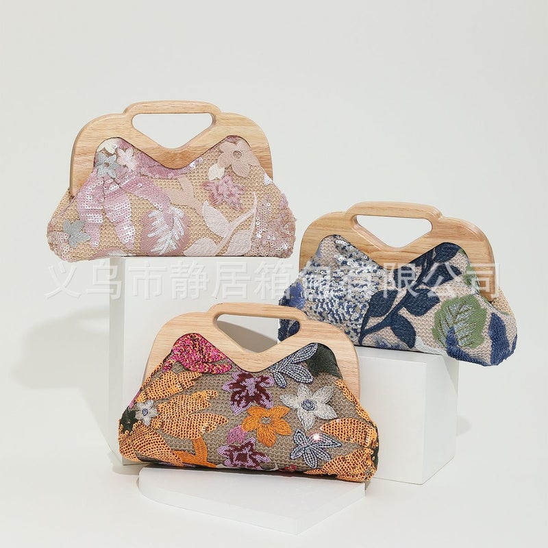 2023 New Flower Sequined Embroidered Papyrus Woven Hand Chain Evening Bag - Image 1