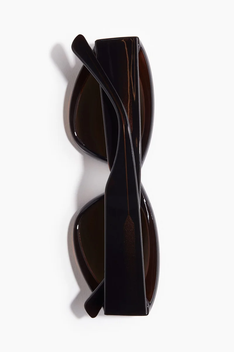 اتش اند ام نظارات شمسية بتصميم بيضاوي