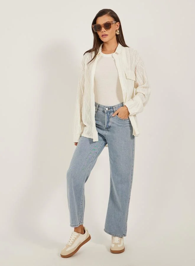 ستايلي بلوزة فضفاضة بتفاصيل بارزة الملمس