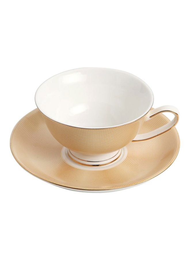2-Piece Ergonomically Designed Fade-Proof Comfortable Grip Cup And Saucer Beige/White 200ml - Image 1