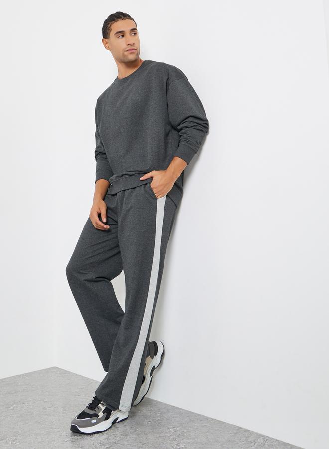 ستايلي طقم منسق من جوغر وسويت شيرت واسع - Image 1