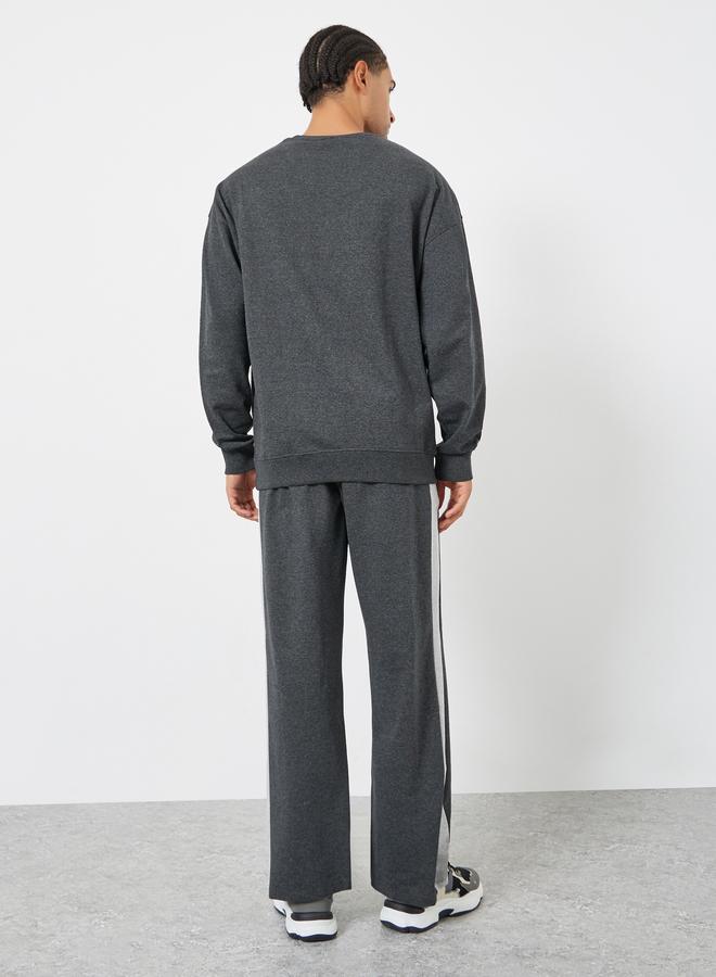 ستايلي طقم منسق من جوغر وسويت شيرت واسع - Image 5