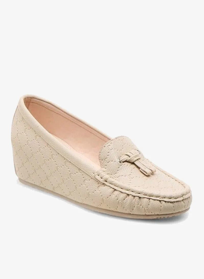 لو كونفورت مونوجرام موكاسين بكعب إسفين