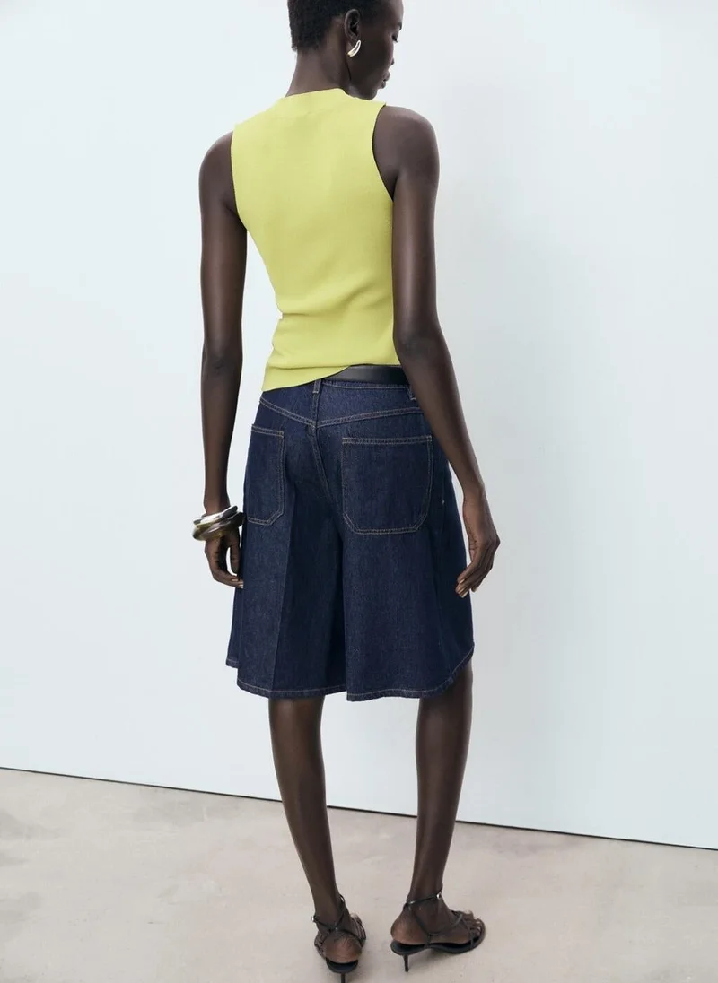 مانجو بلوزة محبوكة مضلعة