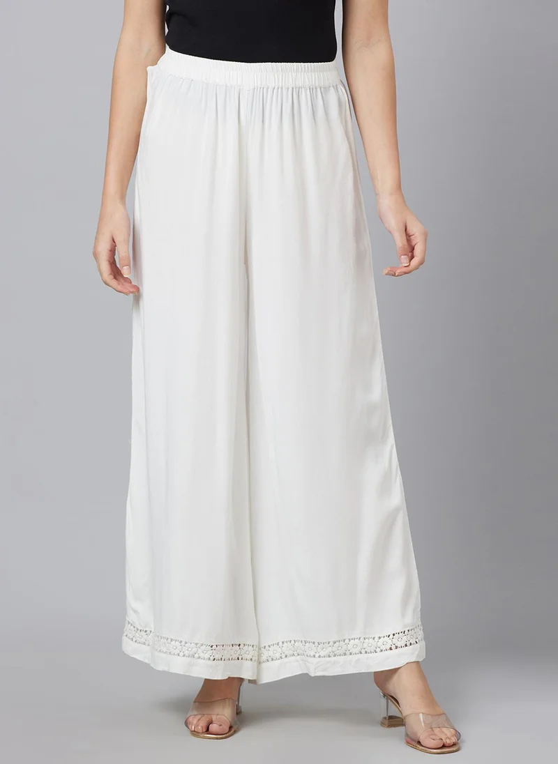 جلو باص بنطلون بالازو نسائي مطرز بالدانتيل بنمط عرقي