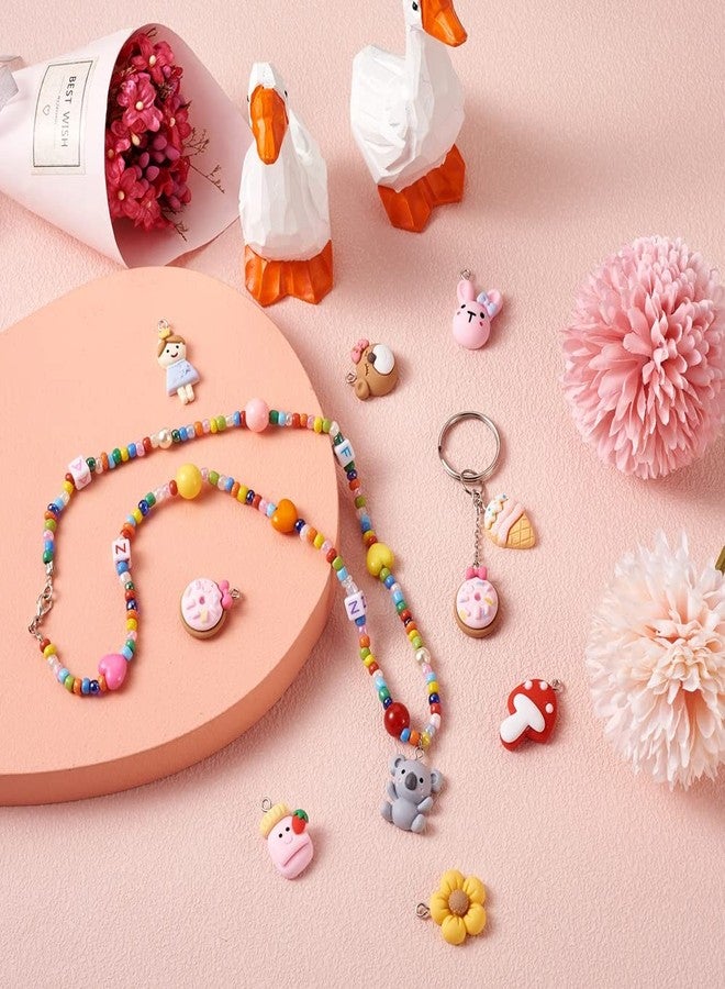 Craftdady مجموعة كرافت دادي من 36 قطعة من دلايات الطعام اللطيفة على شكل حيوانات مصنوعة من الراتنج، تشمل البسكويت والآيس كريم والزهور والأرانب والكوالا، مع حلقة لصنع الأساور والقلائد والأقراط وسلاسل المفاتيح. - Image 3