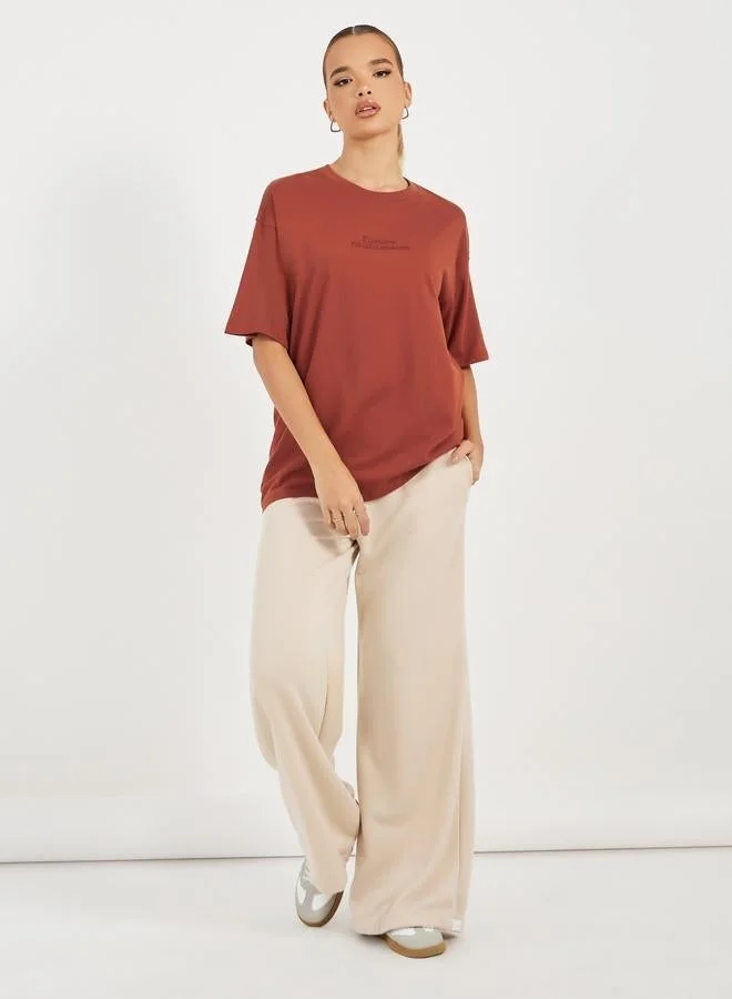 Styli Oversized Embroidered Slogan T-Shirt