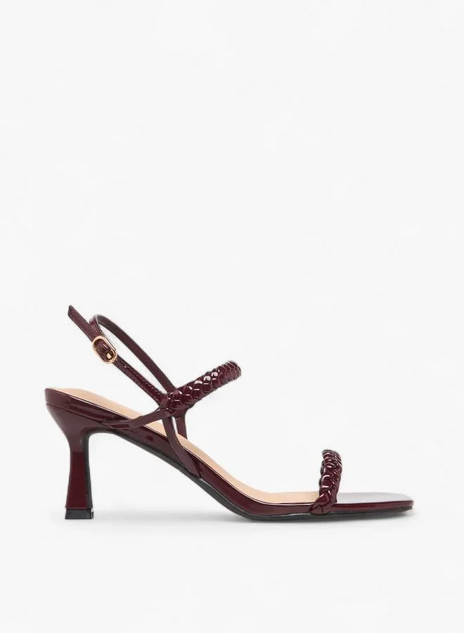 فلورا بيلا من شو إكسبرس صنادل نسائية بكعب واسع ومضفر