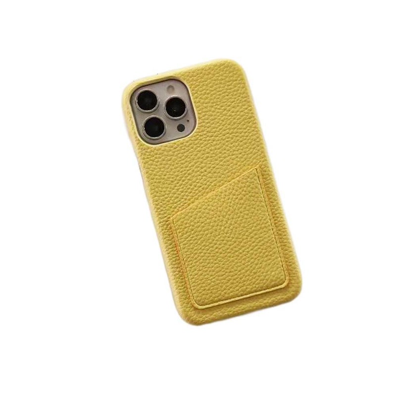 غطاء واقي بملمس جلد لـ iPhone 14 / 14 Plus / 14 Pro / 14 Pro Max مع حامل بطاقات وحماية من السقوط مع مقاوم للصدمات مع ملمس جلد مع تصميم نصف تغطية باللون أصفر - Image 1