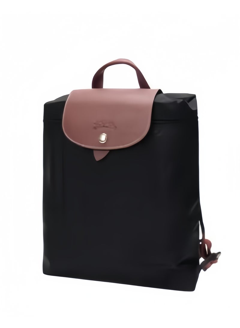 Longchamp Medium backpack with no compartments inside the bag can be used to hold a camera lens. Classic theme pack - Image 2