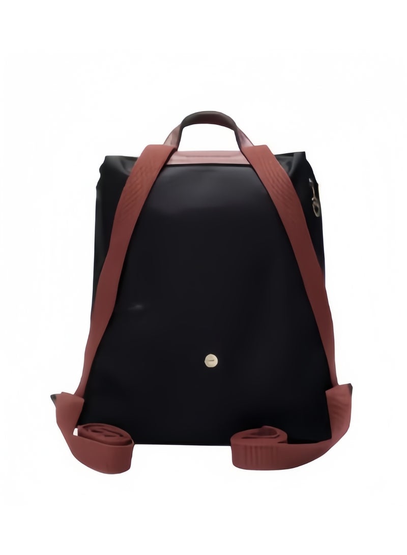 Longchamp Medium backpack with no compartments inside the bag can be used to hold a camera lens. Classic theme pack - Image 5