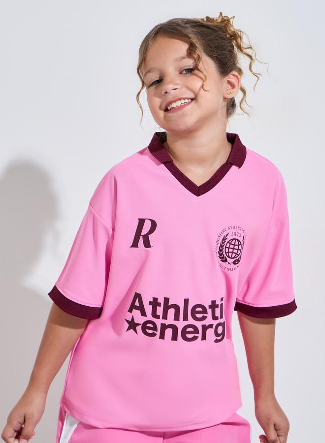 Styli Teen Girls Pink V Neck Oversized Sports Jersey T-Shirt - Image 1