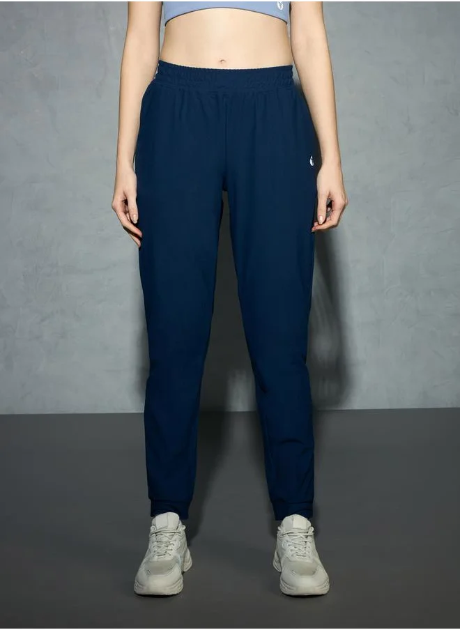تكنوسبورت Logo Print 4-Way Stretch Joggers with Pockets by Styli
