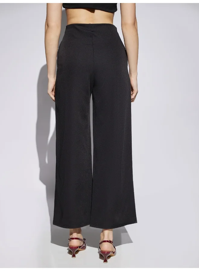 globus Women Black Solid Mid Rise Stretchable Wide Leg Cropped Formal Trousers