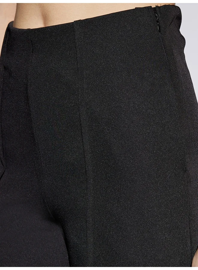 globus Women Black Solid Mid Rise Stretchable Wide Leg Cropped Formal Trousers