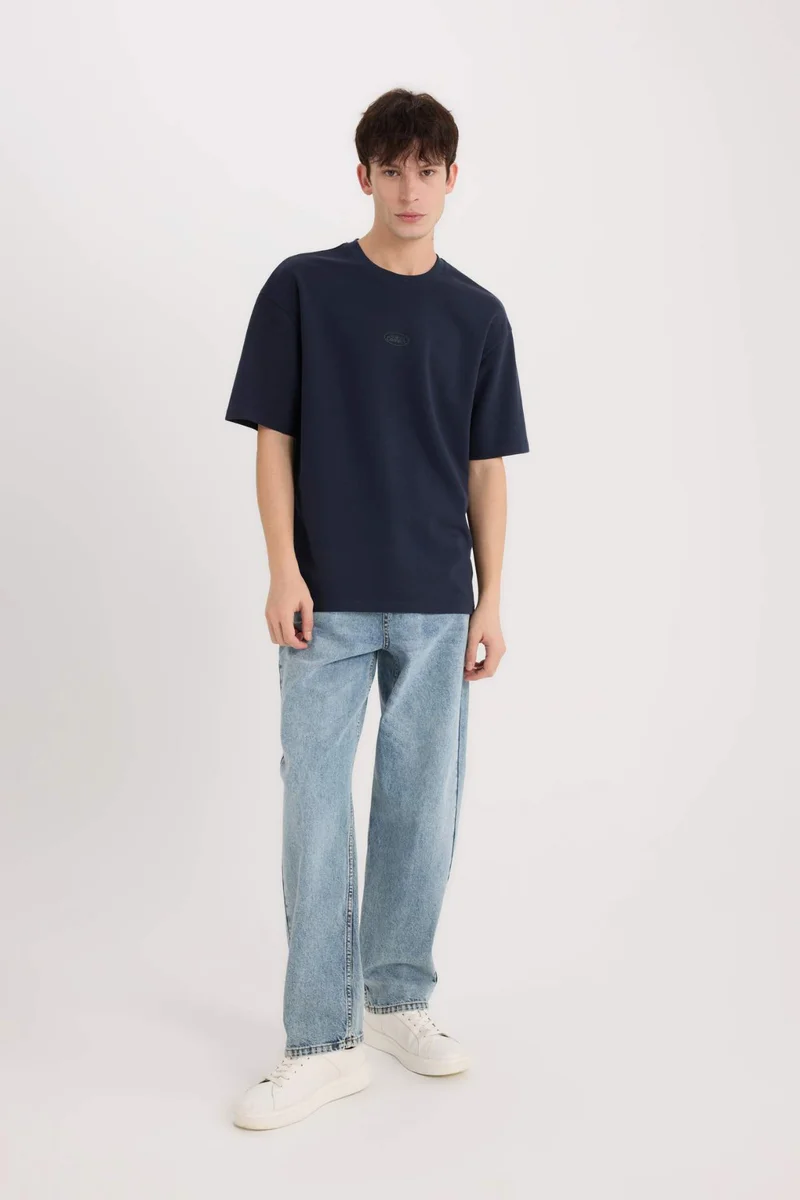 ديفاكتو Boxy Fit Crew Neck Printed Short Sleeve T-Shirt