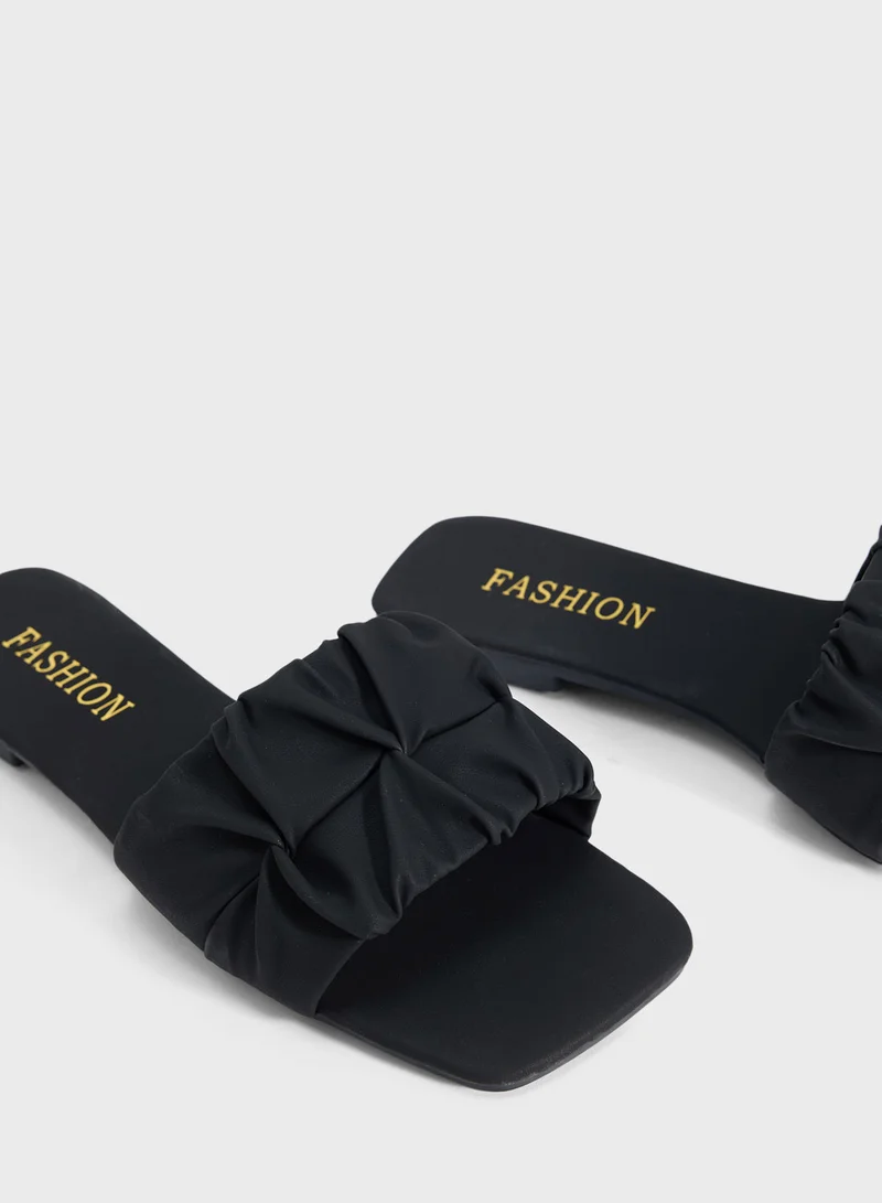 ايلا Ruched Strap Flat Sandal