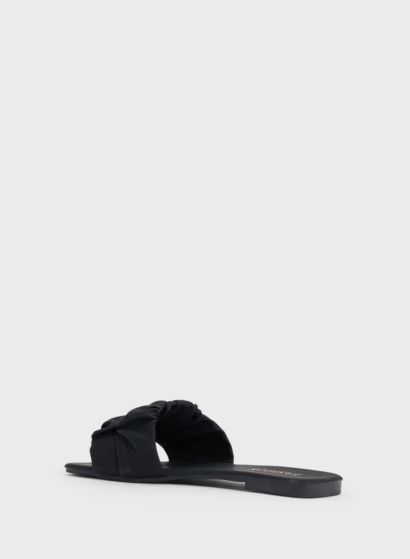 ايلا Ruched Strap Flat Sandal