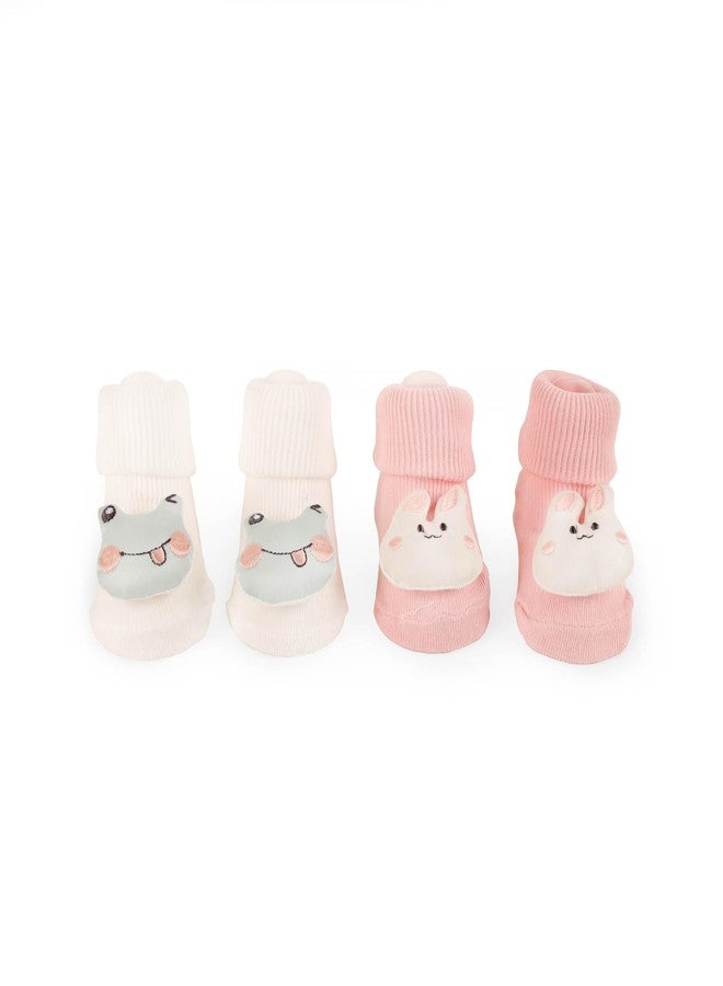 KICKS & CRAWL جوارب أرنب ف fluffy مضادة للانزلاق للأطفال الأولاد والبنات - كيكز وزحف (كريم/وردي) (عبوة من 2) - 0-9 أشهر - Image 1