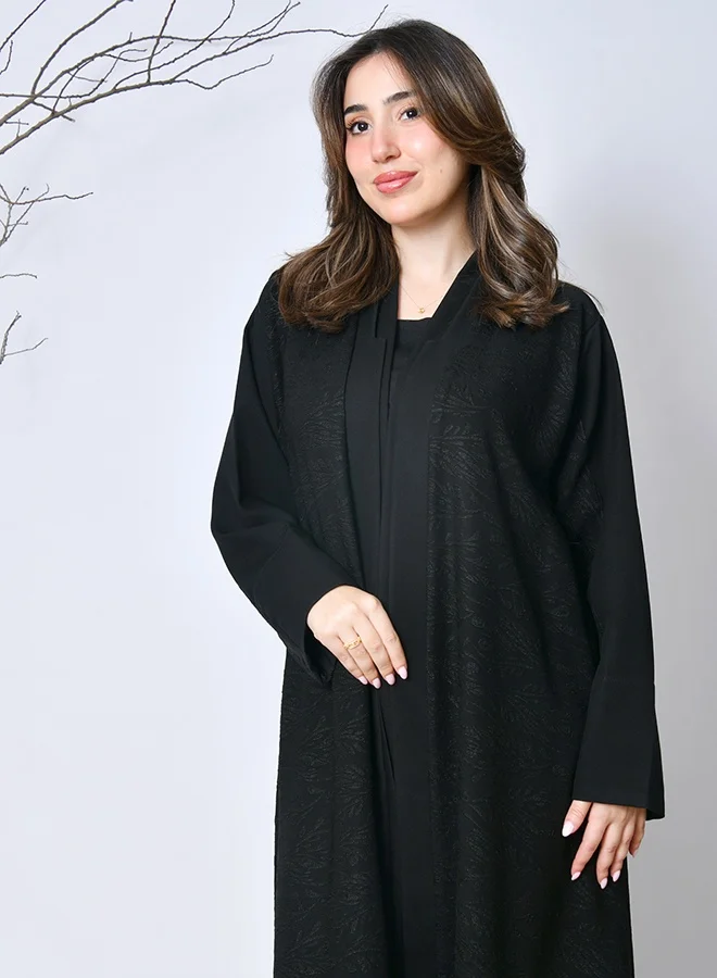 HAWRAA ABAYA Simple and elegant black winter abaya – a practical design from Hawraa Abayas