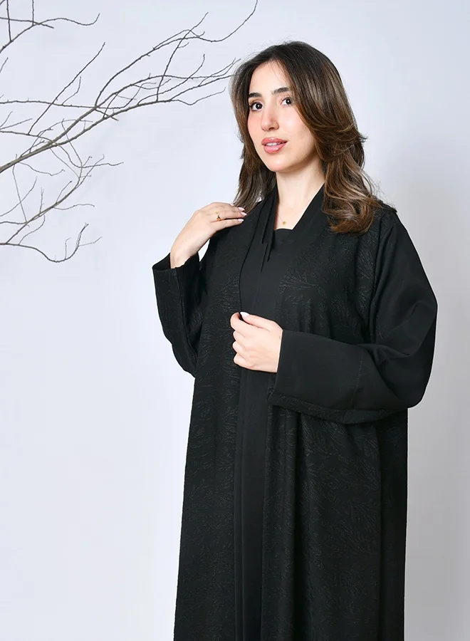 HAWRAA ABAYA Simple and elegant black winter abaya – a practical design from Hawraa Abayas