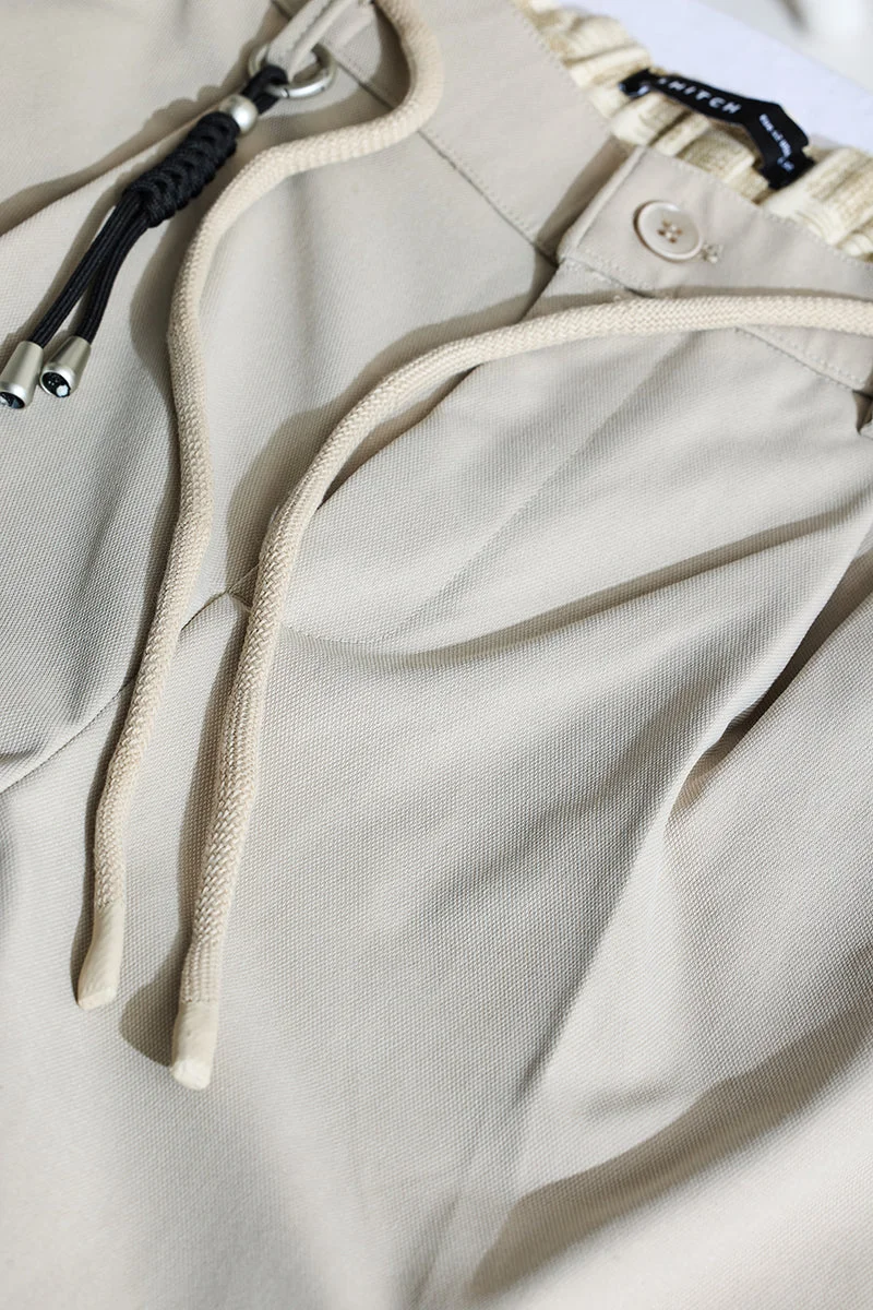 سنيتش Beige Solid Relaxed Casual Trousers