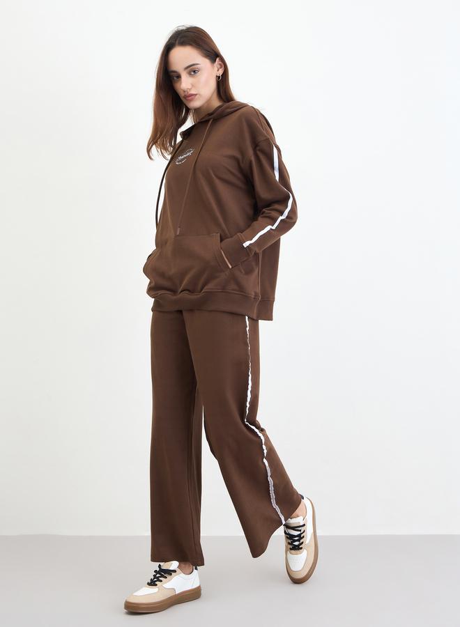 ستايلي طقم منسق من جوغر وهودي طويل بطبعات - Image 1