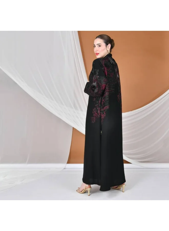 HAWRAA ABAYA Black wrap abaya with a flowing cut, gold and burgundy embroidery, decorated with stones